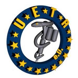 Blaues und gelbes U.E.T.A.-Logo mit Schlangenstab, Sternen und Schriftzug "e. V."