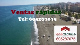 Playa con edificios al fondo, texto: "Ventas rápidas, Tel: 605287075".