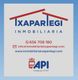 "Logotipo de Inmobiliaria Ixapartegi con contacto y sitio web en fondo azul claro."