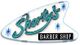 Retro style sign reading "Shorty's Barber Shop" with stars on a white background.
