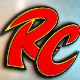 Texto "RC" en rojo y amarillo con borde negro sobre fondo claro.
