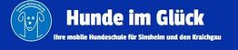 Blaues Logo mit der Aufschrift „Hunde im Glück“ für eine mobile Hundeschule in Sinsheim.