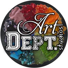 Art Dept. Studios logo with colorful textures in a circular design.