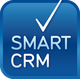Logo mit blauem Hintergrund und weißem Text "SMART CRM" sowie einem Häkchen darüber.