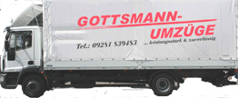 LKW mit Plane, Aufschrift "Gottsmann-Umzüge", Telefonnummer und Hinweis auf Zuverlässigkeit.