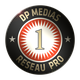 Écusson rond noir avec "DP Medias Réseau Pro" et le chiffre 1 au centre.