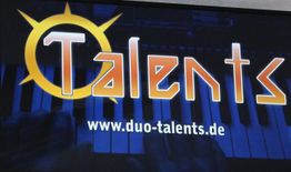 Text: "Talents" über einem Piano, URL: www.duo-talents.de.