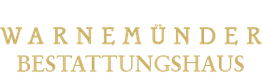 Logo des Warnemünder Bestattungshauses in goldener Schrift auf schwarzem Hintergrund.