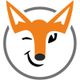 Winkender, orange-grauer Fuchs in einem Kreis – Logo-Design auf weißem Hintergrund.