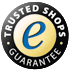 Trusted Shops Logo mit "e" und "Guarantee" in einem runden Emblem auf schwarzem Hintergrund.