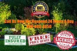 Garden at night with "Call Us Now 24/7" text and service badges: guaranteed, insured, licensed.