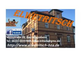 Firmengebäude Elwetritsch in Bad Bergzabern mit Kontaktdaten und Facebook-Logo.