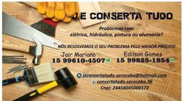 Ferramentas sobre mesa com informações de contato para serviço de reparos.