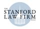Logo of The Stanford Law Firm with a blue circle and white tower silhouette.