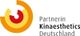 Logo von Partnerin Kinaesthetics Deutschland mit bunten, ineinander greifenden Kreisen.