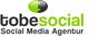 Logo der Agentur "tobesocial" in Schwarz und Grün mit Schriftzug "Social Media Agentur".