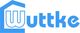 Blaues Logo mit dem Text "Wuttke" und einem stilisierten Haus über dem Buchstaben "W".