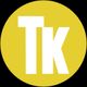 Gul cirkel med hvide bogstaver "Tk" i midten.