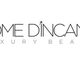 Logo con testo "Come D'Incanto Luxury Beauty" su sfondo bianco.