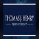 Blue logo with white text: "Thomas J. Henry Injury Attorneys" on dark background.