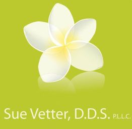 White frangipani flower on green background with "Sue Vetter, D.D.S. P.L.L.C." text below.