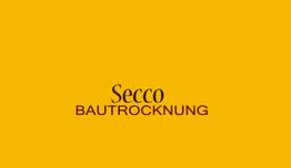 Gelber Hintergrund mit der Aufschrift "Secco Bautrocknung" in schwarzer Schrift.