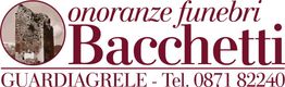 Logo di "onoranze funebri Bacchetti" con numero di telefono e immagine di una torre antica.