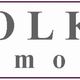 Logo von Volkmer Immobilien mit Haus- und Baum-Symbol auf lila Hintergrund.