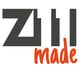Zwart "ZII" logo met rood "made" eronder.