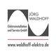 Logo mit stilisiertem Sinuskurven-Design und Text "Jörg Waldhoff Elektroinstallation".