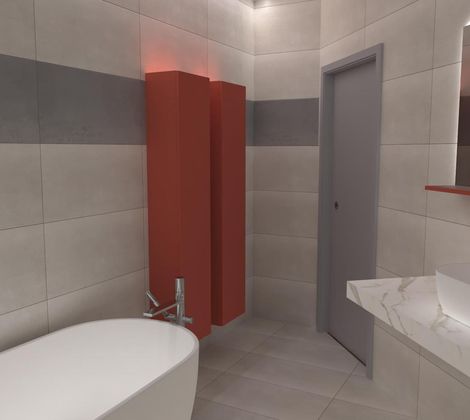 Bagno moderno con vasca bianca, mobile rosso, pareti grigie e lavandino su piano in marmo.
