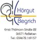 Logo von Hörgut Begrich mit Adresse und Telefonnummer darunter.