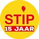 Gele cirkel met rode tekst: "STIP" en "15 JAAR". Boven "STIP" hangt een rode ballon.