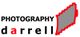 Schwarz-rotes Logo: "PHOTOGRAPHY darrell" mit grauer, gezackter Form rechts.