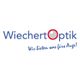 Logo von Wiechert Optik mit dem Slogan: "Wir bieten was fürs Auge!".