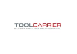 Logo mit Aufschrift "TOOLCARRIER: Internationaler Werkzeuggroßhandel" in Grau und Rot.