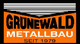 Logo von Grunewald Metallbau mit Schriftzug "Seit 1979", orange und schwarz gestaltet.