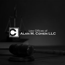 Gavel on a desk with "Law Offices of Alan M. Cohen LLC" logo in the background.