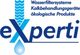 Logo mit Text "eXperti" und Slogan über Wasserfiltersysteme und ökologische Produkte.