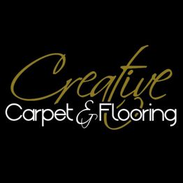 Creative Carpet & Flooring logo with elegant script on a black background.