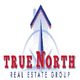 Logo of True North Real Estate Group with a stylized house and compass design.