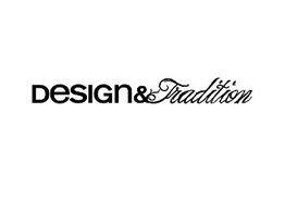Der Text "Design & Tradition" in schwarz auf weißem Hintergrund.