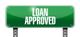 Green sign with the words "Loan Approved" in white, mounted on metal poles.