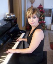 Olga Sherra - Klavierunterricht bei Ihnen zu Hause Logo