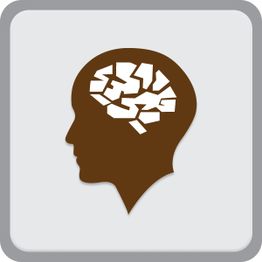 Sagoma di testa umana con cervello stilizzato formato da tessere di puzzle.