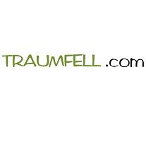 Text: "TRAUMFELL.com" in grüner und schwarzer Schrift auf weißem Hintergrund.