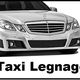 Auto bianca con scritto "Taxi Legnago" sotto.