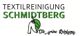 Logo der Textilreinigung Schmidtberg mit grünem Blattmotiv und Slogan "Die grüne Reinigung".