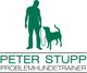 Silhouette eines Hundetrainers mit Hund und Leine, Text: "Peter Stupp, Problemhundetrainer".