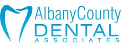 Logo of Albany County Dental Associates with a blue tooth graphic.